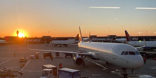 The Delta plane at Atlanta airport during sunrise