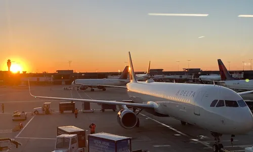 The Delta plane at Atlanta airport during sunrise